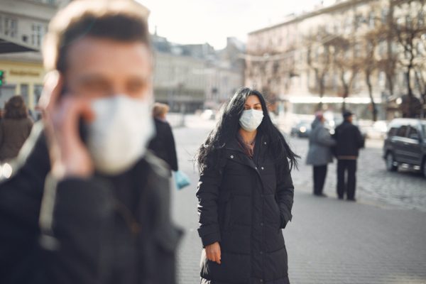 A woman with face mask on